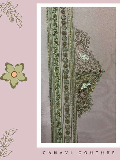 A close-up of a delicate paisley motif being embroidered. This image highlights the intricate details and the blend of different threads and materials used to create depth and texture in my designs.