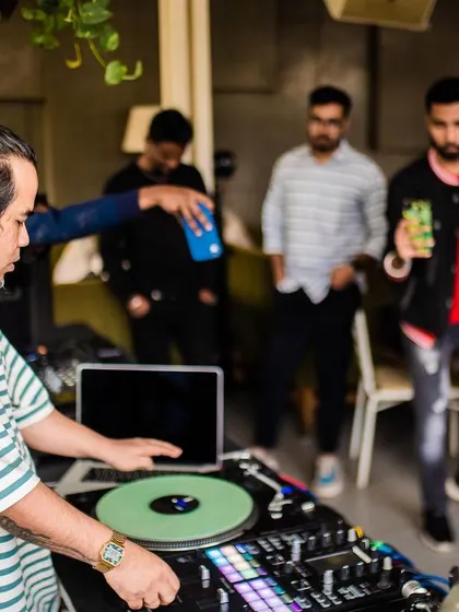 As the tables turn. A shot from another live event, showing me focused on the mix with the crowd watching.