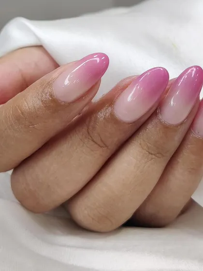 A close-up showcasing the smooth transition of our pink ombré design. The high-gloss finish makes the colors pop.
