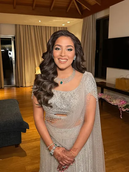 Another shot capturing the joy and elegance of this classic curly hairstyle.