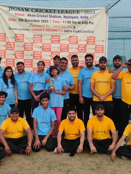 A group photo of both teams, Aniket Titans and Sid's Daredevils, after a competitive and fun-filled day.