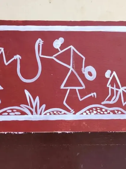 This section of the mural tells a story from nature or folklore, featuring figures interacting with a snake. The simple stick figures convey a dynamic and engaging narrative.