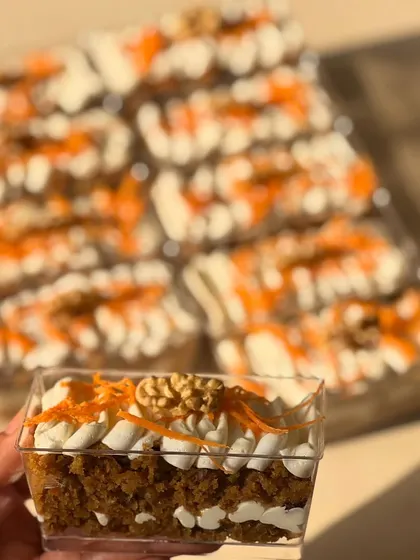 My carrot cake is a healthy treat that doesn't compromise on flavor. It's made without refined flour or sugar and topped with a light cream cheese frosting.