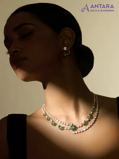‘Poetic bloom’ in Polki. Our floral-inspired necklaces echo nature's grace with intricate craftsmanship, featuring emeralds and diamonds in a timeless design.