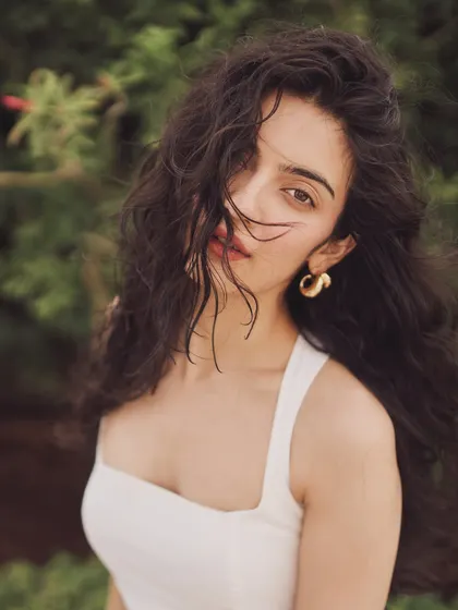 The beautiful Pratibha Ranta in a simple white sundress. This look is all about natural beauty and effortless style, perfect for a summer event.