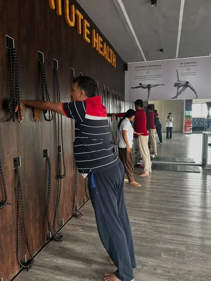 A chest and shoulder opening stretch using the wall. This is an excellent preparation for deeper backbends and helps to counteract the effects of rounding the shoulders.