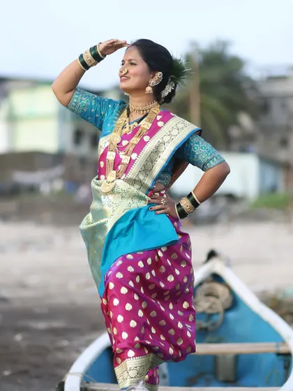I take immense pride in creating authentic cultural looks. This is a traditional Koli look for Narali Pournima, complete with the typical saree drape and accessories. It’s a celebration of our heritage, perfect for festivals and themed photoshoots.