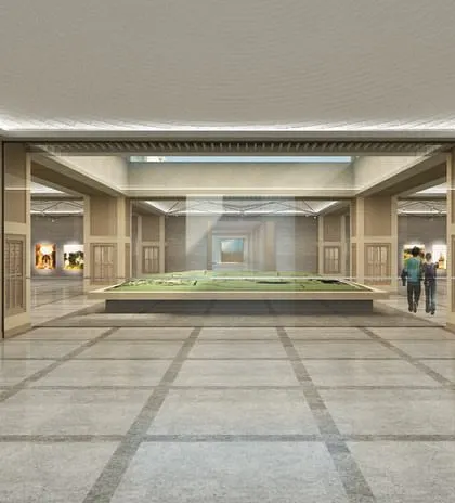A view towards a central model display at the Qutub-Shahi Centre. The layout is organized with a clear sense of order, guiding visitors through the exhibition while maintaining a feeling of spaciousness.