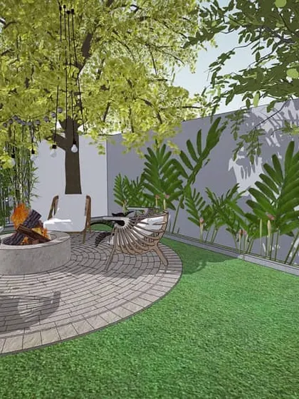 A cozy fire pit and seating area designed for the garden of Retreat Villa 90. This space provides a perfect spot for evening gatherings, surrounded by bamboo and other carefully selected plants for privacy.