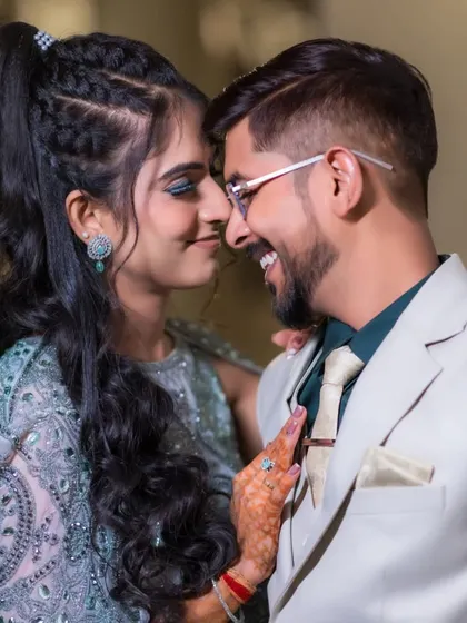 A close-up of the couple sharing a happy, intimate moment during their engagement photo session.