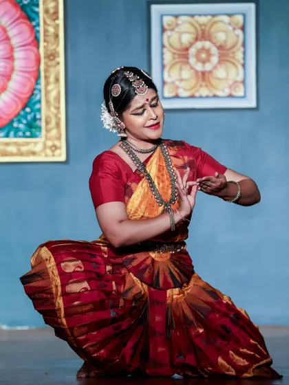 Abhinaya, or the art of expression, is the soul of Bharatanatyam. In this moment, I am portraying a specific emotion from a story, using hand gestures (mudras) and facial expressions. In my classes, we focus deeply on these storytelling techniques to make the dance meaningful.