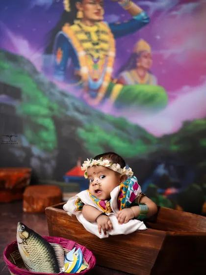 This little 'nakhwin' (fisherwoman) is ready for her journey. A unique and adorable way to honour our local traditions.