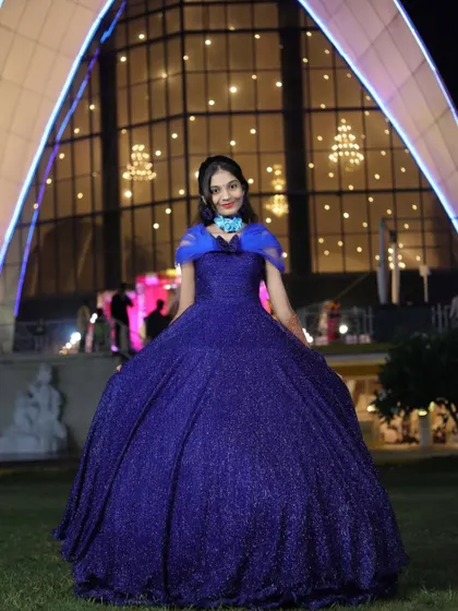 The full view of the magnificent blue ball gown, designed to make a statement.