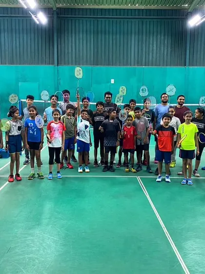 A full group of our junior badminton players and coaches on match day. The energy and enthusiasm are what make these events so special.
