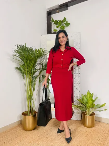 This red co-ord set with a collared top and matching skirt is a very smart and powerful workwear look. It's a great alternative to a formal dress.