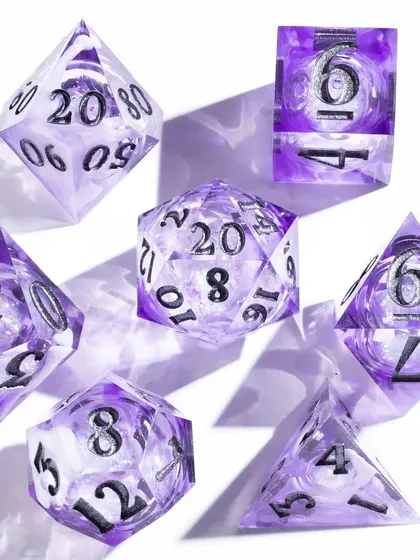 A clean hero shot of a purple dice set from Wild Earth Dice. The crisp white background and hard lighting create sharp, defined shadows, making the intricate details and swirling colors inside the dice stand out.