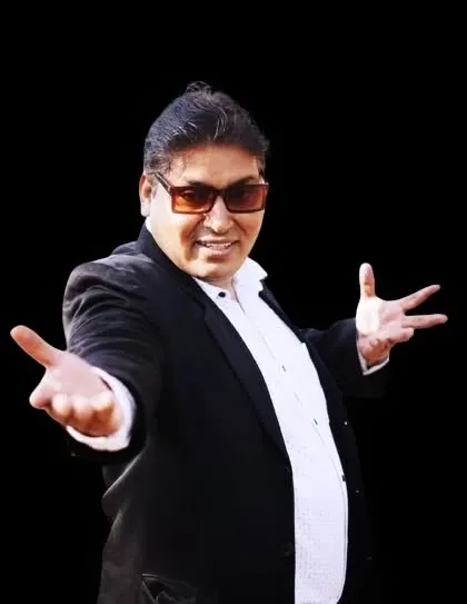 A promotional headshot. I am always ready to bring my energy and expertise to your next event, whether it's in Patna or anywhere else in India.