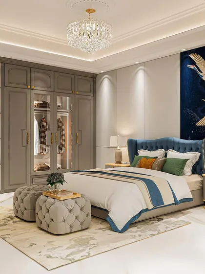 The elegant wardrobe with glass doors and an open shelving unit provides ample storage while adding to the room's luxurious feel.
