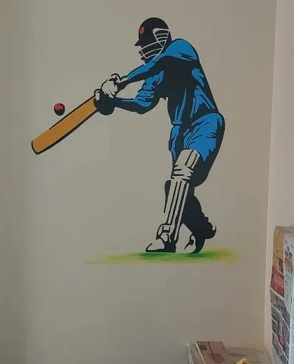 A custom wall mural of a cricketer in action, making a bold statement in a sports enthusiast's room.