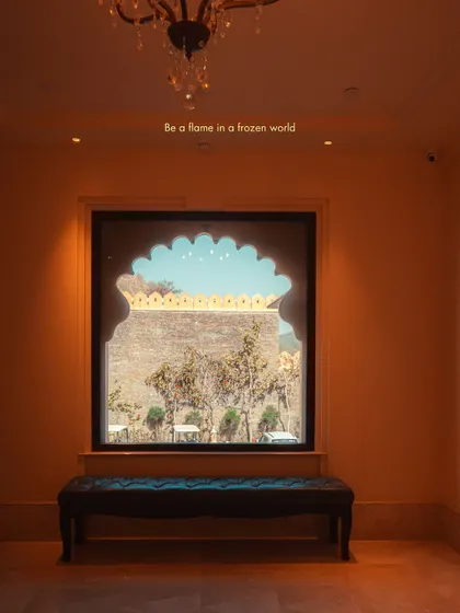 A beautifully framed window at the Aurika hotel in Udaipur. The archway and warm lighting create an image that feels like a painting, a flame in a frozen world.