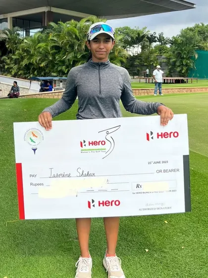 A Student Posing with Her Winner's Cheque: A huge round of applause for Jasmine Shekar, another one of our talented golfers, on her exceptional performance winning Leg 13 of the Hero WGPT 2024.