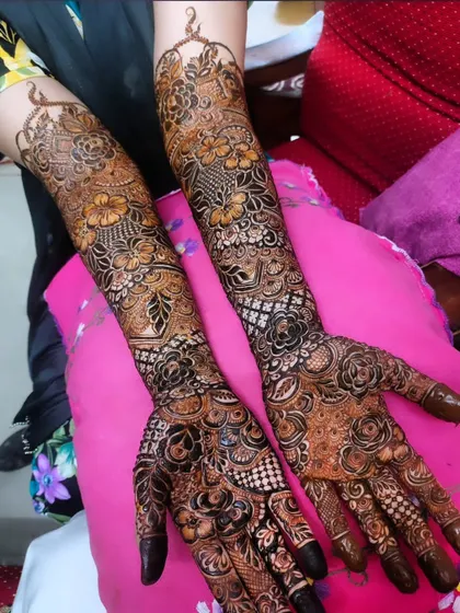 The complete view of a stunning bridal henna application, ready for the wedding festivities.