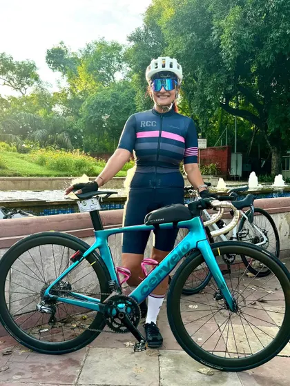 The birthday girl posing with her beautiful Cervelo bike.