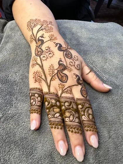 An artistic design featuring a tree with peacocks perched on its branches. This is a unique and beautiful choice for someone who loves nature-inspired motifs.