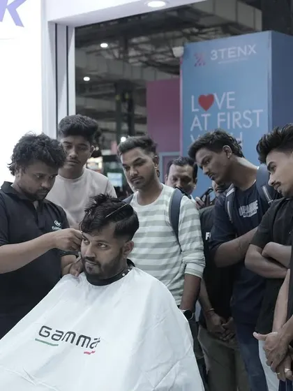 A shot from a live haircutting demonstration. I enjoy sharing my techniques and passion for barbering with others in the industry.