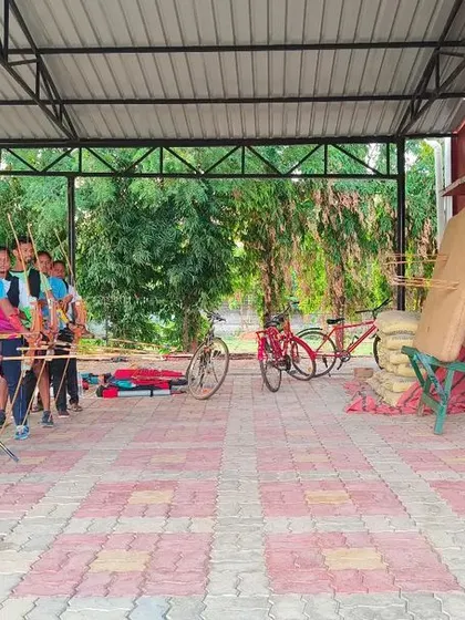 Young archers line up to practice their aim. We provide the necessary infrastructure and coaching to help our athletes hone their skills in a safe and structured environment.