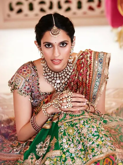 A closer look at the stunning details of the custom Anamika Khanna lehenga. The mix of colors, textures, and traditional motifs is what makes this piece a work of art.