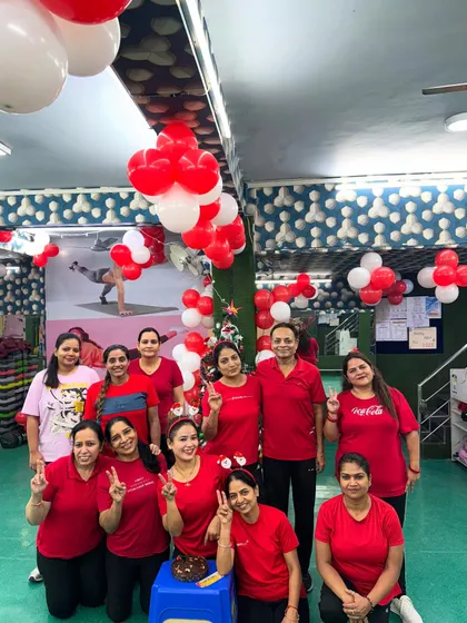 Our studio is our happy place, especially when it's decorated for Christmas. A group photo with our wonderful members.