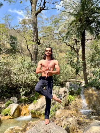 Dhyana, or meditation, is the instrument for gaining self-knowledge. Here, I am in a state of dhyana amidst the beauty of nature.