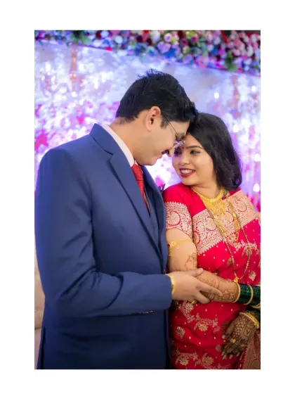 A beautifully framed portrait of the couple at their reception, their connection shining through.