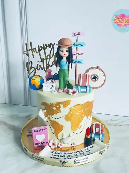 A passport to adventure! This cake for Isha Batra takes you on a delicious journey around the world, with signs pointing to Bali, Greece, and Europe.