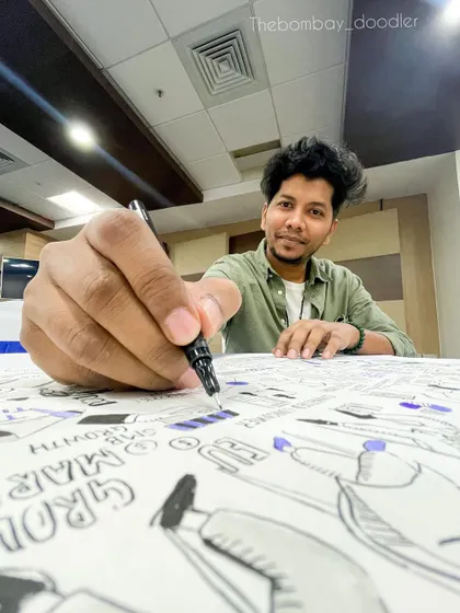 A close-up shot of me working on a corporate sketchnote. My goal is to capture the essence of the discussion, celebrating teamwork and the power of ideas.