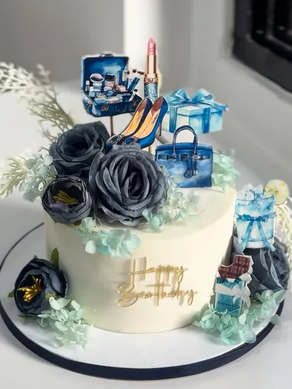 When elegance meets a little sparkle, this luxury-themed birthday cake says it all. From designer heels to glam gift boxes, every detail screams "celebration done right."