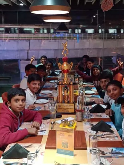 A well-deserved team dinner to celebrate the U13 team's championship victory. We believe in celebrating our successes together as a family.