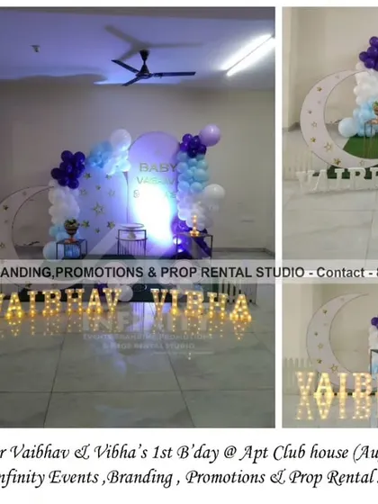 A magical "Twinkle Twinkle" theme for a twin first birthday. The setup at an apartment clubhouse includes semi-arch and moon backdrops, a beautiful balloon garland, and large marquee letters spelling out both names.