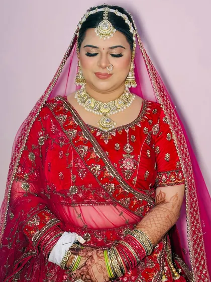 Another beautiful shot with eyes closed, emphasizing the detailed eye makeup and liner.