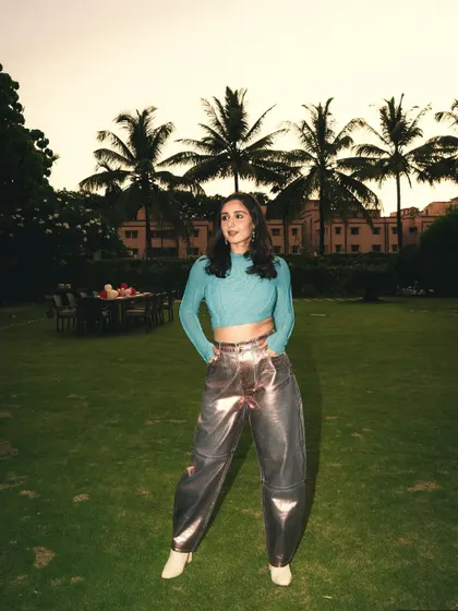 The full look in a relaxed setting. This shows how a stage outfit can also work for a cool, edgy photoshoot.