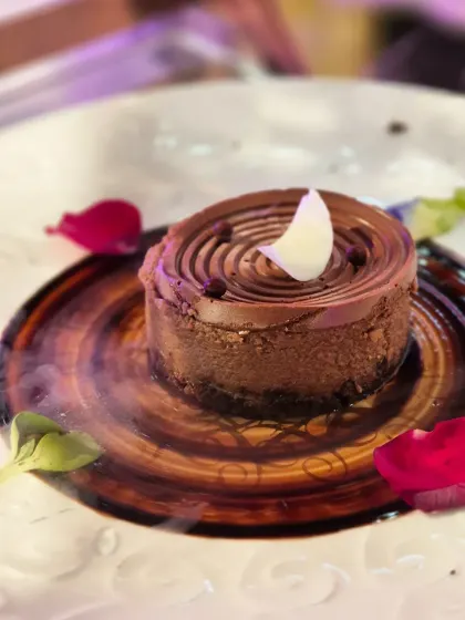 A dessert that is both dramatic and delicious. Our Hazelnut Swirl Cheesecake is presented with a smoky effect, creating a moment of theatre before you even take the first bite of its rich, nutty flavour.
