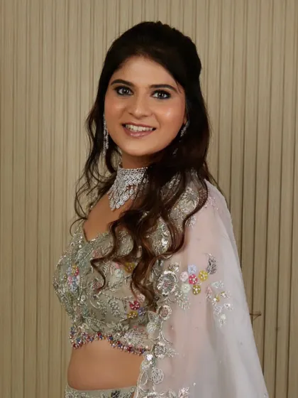 A proud moment seeing my student's work on this model, featuring a soft glam look with a beautiful pastel lehenga.