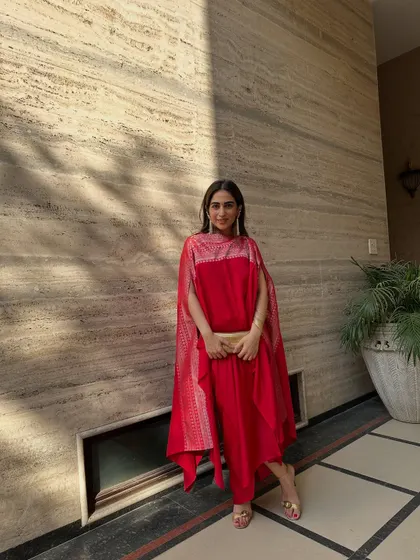 This red cape set from Sobariko is a modern take on festive wear. It’s comfortable, chic, and makes a statement without being over the top.