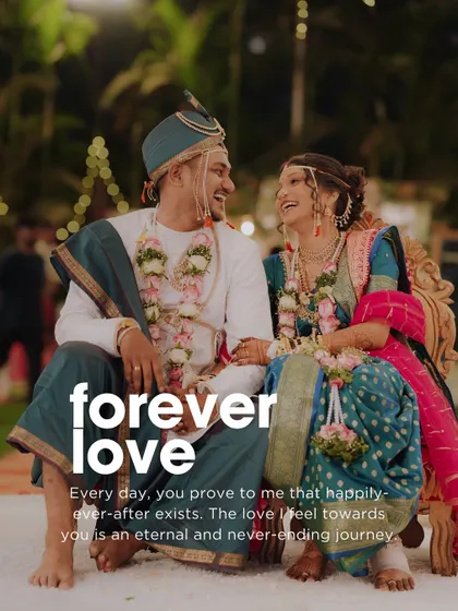 "Forever love" perfectly describes this image. The genuine laughter between the couple, dressed in their traditional wedding best, is a testament to their happiness.