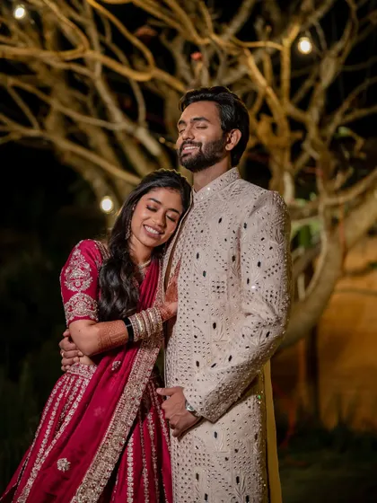 A quiet moment of togetherness during the Sangeet. Amidst the celebration, we find the pockets of intimacy that truly define your relationship.
