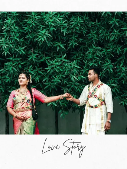 A beautiful "Love Story" portrait of the couple against a vibrant green backdrop, the bride leading the groom by the hand.