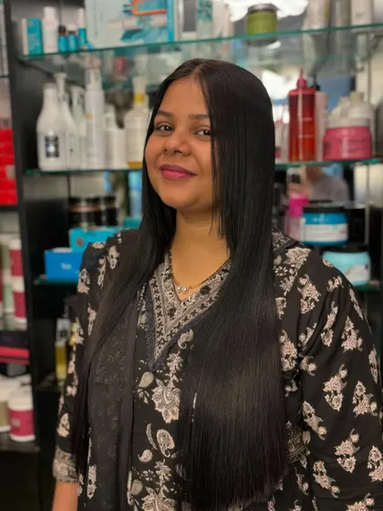 Look at that smooth, silky perfection. Our hair smoothening treatments are designed to make your hair dreams a reality.