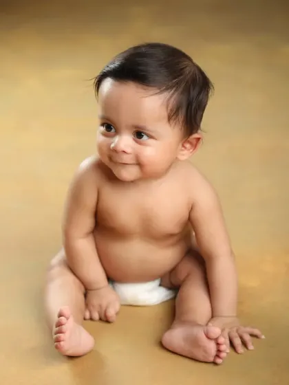 That little smile is everything! Simple, classic portraits on a solid background are perfect for capturing every sweet expression.