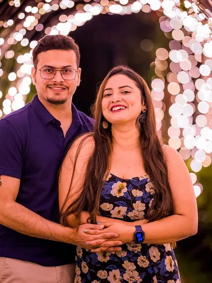 A happy and bright portrait inside the tunnel of lights. The couple's smiles are infectious in this beautifully lit, joyful pre-wedding photo.